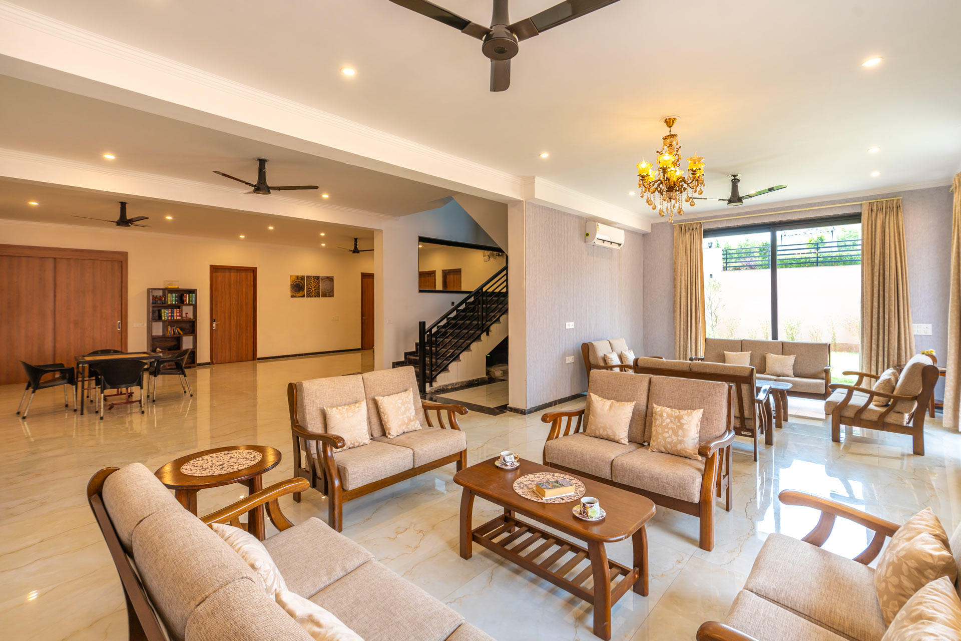 Spacious farmhouse hall with modern interiors and seating area